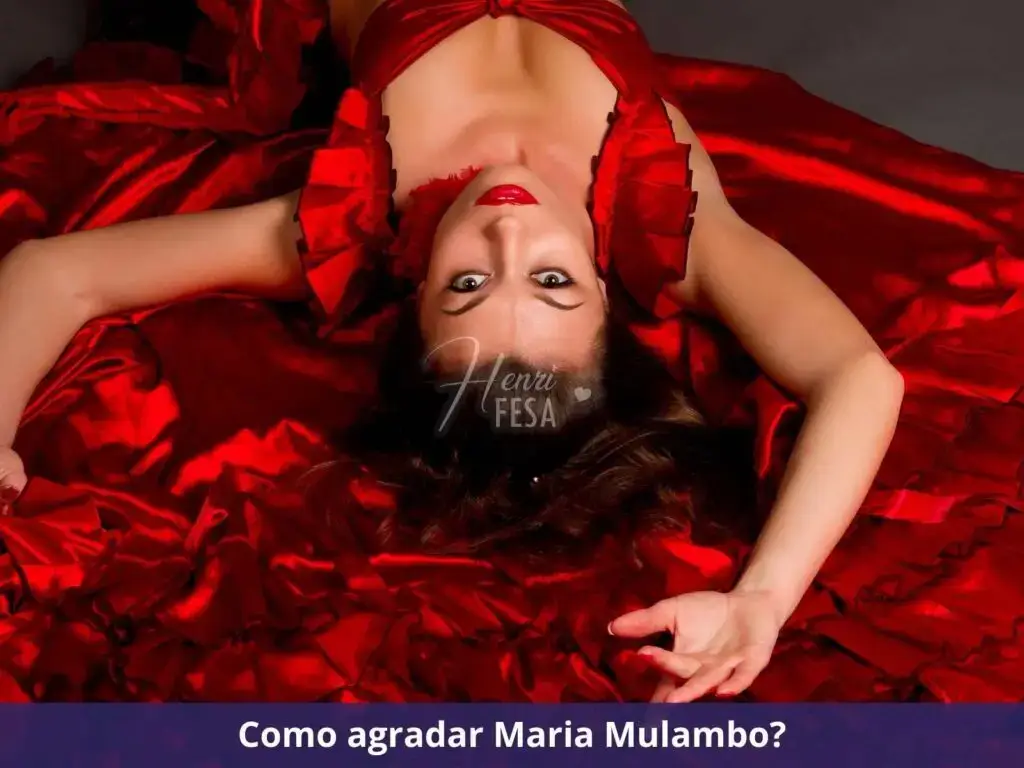 O que Maria Mulambo faz na vida das pessoas? Imagem de uma mulher cigana de vestido vermelho deita sobre um tecido vermelho em posição erótica.